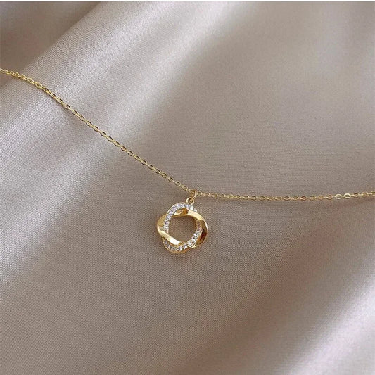 INFINITY - Gold-Plated Crystal Knot Pendant Necklace
